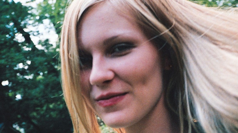 Kirsten Dunst smiles at camera virgin suicides