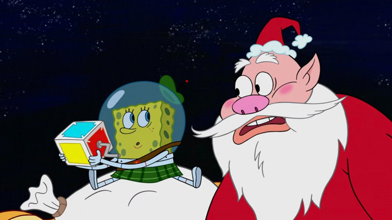 SpongeBob playing with a jack in the box while Santa watches on SpongeBob SquarePants
