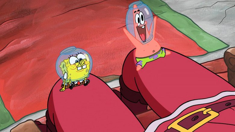 SpongeBob and Patrick sitting on Santa's lap
