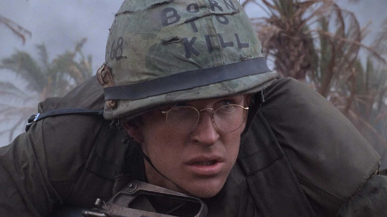 Joker (Matthew Modine) takes cover by trees in Full Metal Jacket