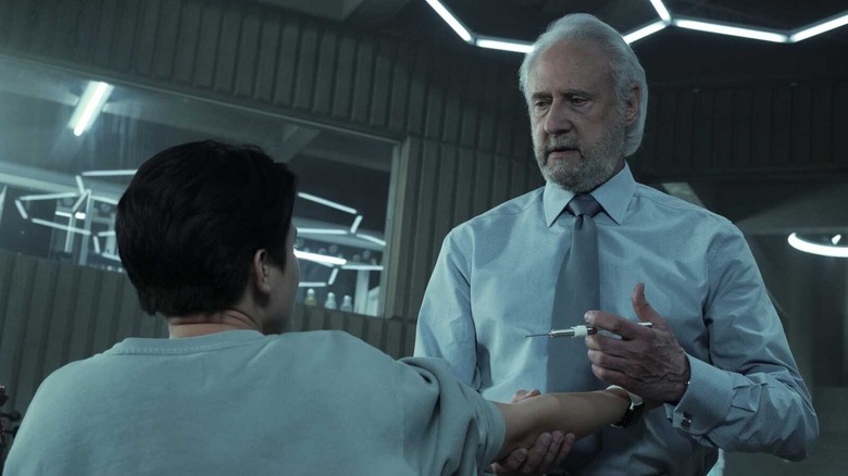 Adam Soong about to inject his daughter with a needle in an episode of Star Trek: Picard.