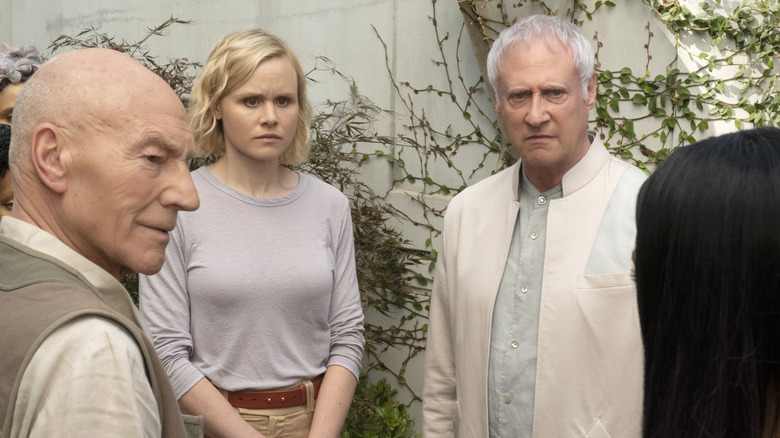 Sir Patrick Stewart as Jean-Luc Picard; Brent Spiner as Alton Soong; Alison Pill as Agnes Jurati, standing around each other, talking to someone on Star Trek: Picard.