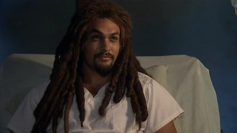 Ronon Dex wearing dreadlocks and a hospital gown on Stargate Atlantis