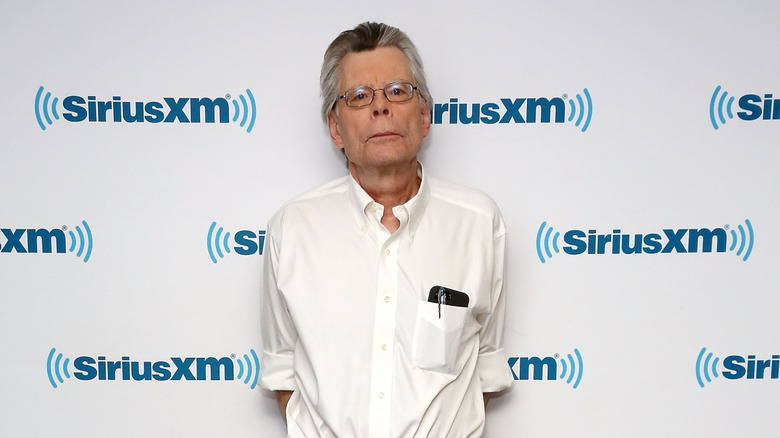Stephen King posing for a photo