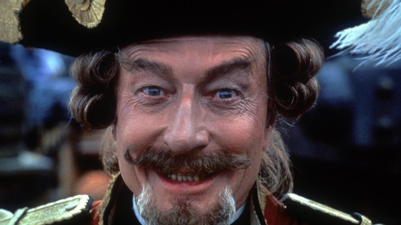 John Neville in The Adventures of Baron Munchausen