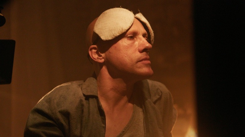 Christoph Waltz in The Zero Theorem pads on head