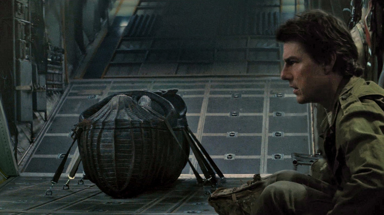 Nick Morton on a plane with a big sarcaphegous in The Mummy