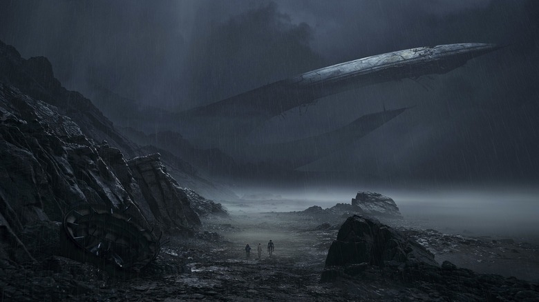 A trio of travelers walking towards a mysterious crashed ship in the rain in Star Wars: Fate of the Old Republic