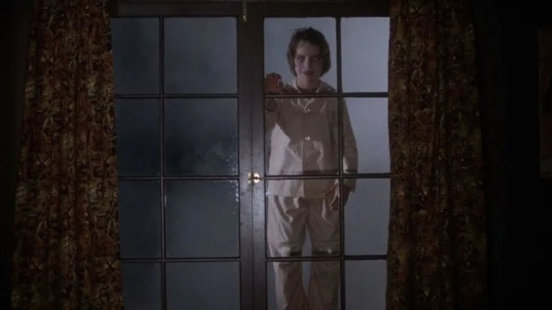 Vampire boy Danny Glick floating outside a window in Salem's Lot (1979)