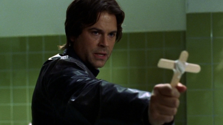 Ben holds up a makeshift cross in Salem's Lot (2004)