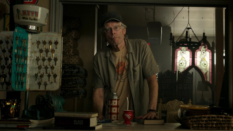 Pawn Shop owner standing behind the counter in It: Chapter Two