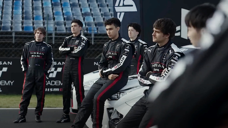Jann and his crew next to their cars