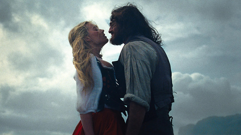 Margot Robbie as Catherine and Jacob Elordi as Heathcliff standing together in Wuthering Heights (2026)