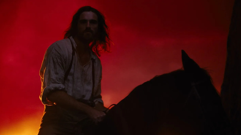 Jacob Elordi as Heathcliff riding a horse in Wuthering Heights