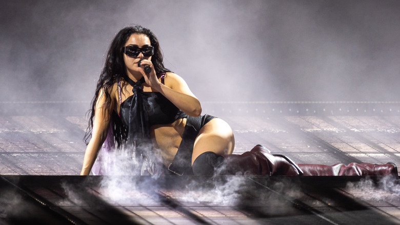 Charli XCX works on the other stage during the fourth day of the GlastonBury 2025 Festival in Worky Farm, Pilton on June 28, 2025 in GlastonBury, England