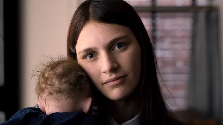 Leanne holds baby doll