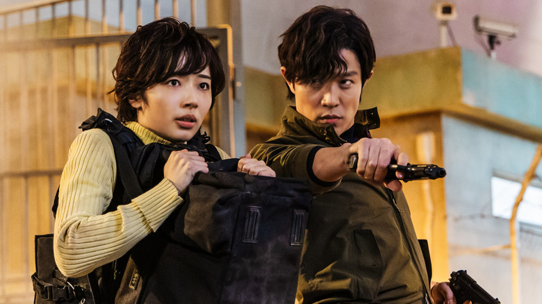Ryo Saeba looks real cool wielding two guns in City Hunter