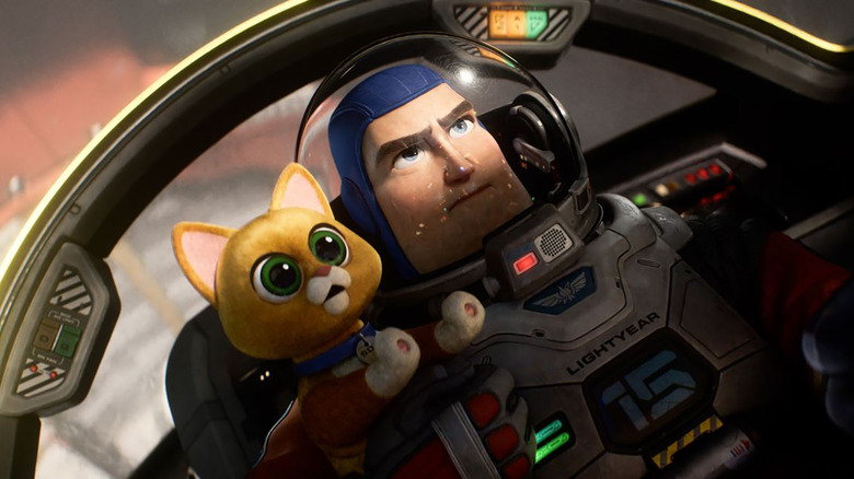 buzz lightyear and robot cat sox in a spaceship in the movie lightyear