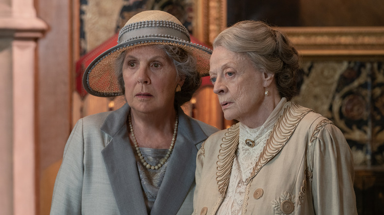 Penelope Wilton and Maggie Smith looking puzzled in Downton Abbey: A New Era