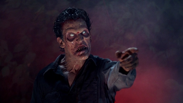 Ash, monster-fied, pointing his finger in Evil Dead 2: Dead By Dawn