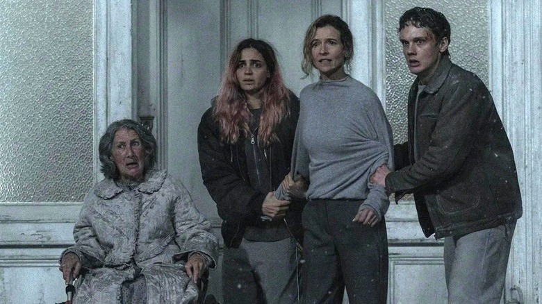 Polly, Alice, Susan and Joseph are terrified while watching Evil Dead Burn
