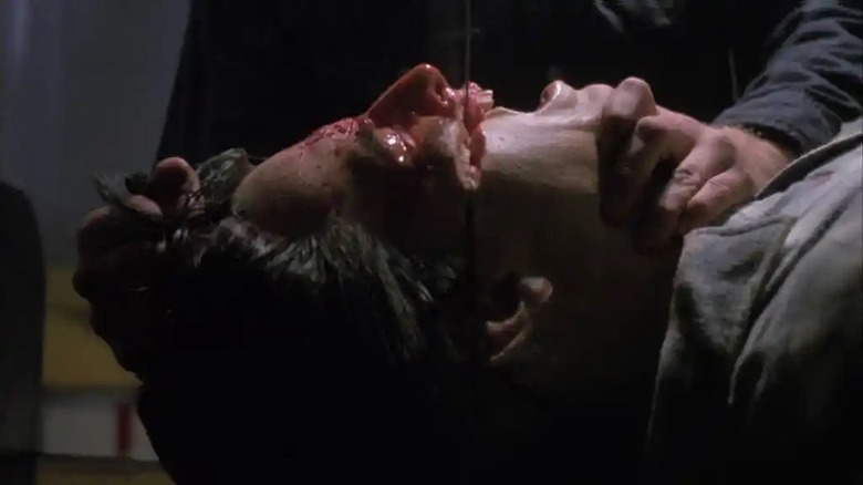David Burns, as Craig Peterson gets slices in the intruder