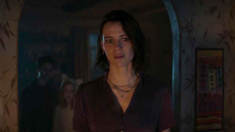 Beth worried in Evil Dead Rise.