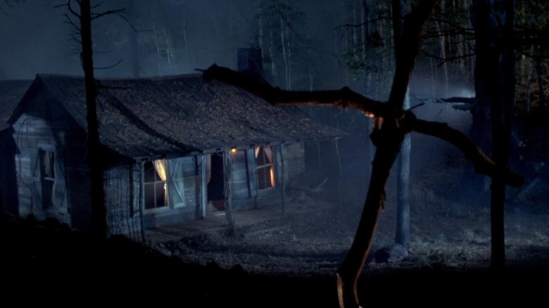 A makeshift grave outside a spooky cabin in the woods. From Evil Dead 2: Dead By Dawn