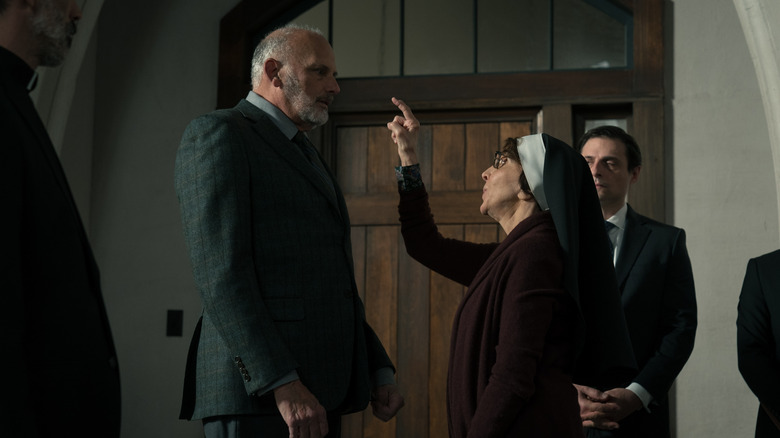 Anthony DeSando as Father Katagas, Kurt Fuller as Dr. Kurt Boggs, and Andrea Martin as Sister Andrea in Evil episode 4, Season 3 streaming on Paramount+, 2022.