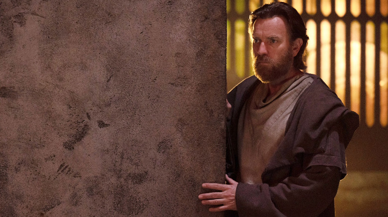Ewan McGregor looking around a corner in Obi-Wan Kenobi