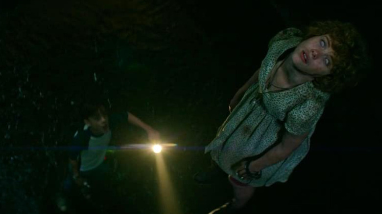 Jaeden Martell and Sophia Lillis in It