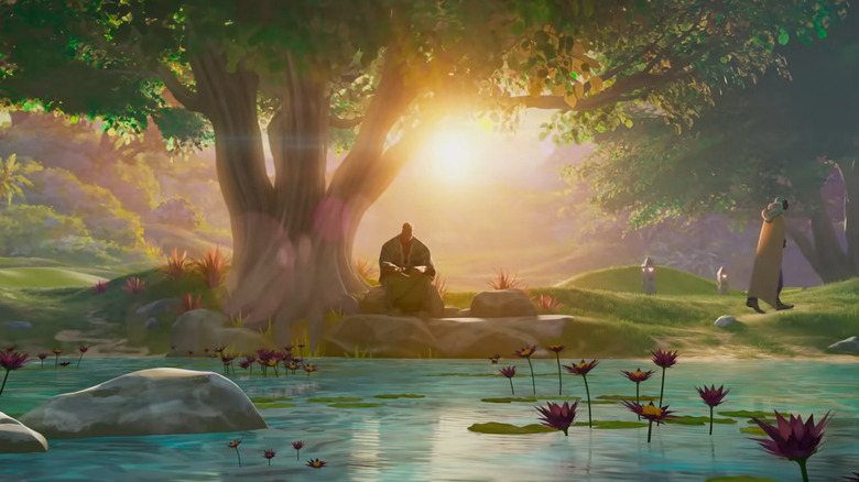 B'Kai sitting by the water under a tree in Wakanda in Marvel's Eyes of Wakanda