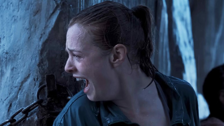 Jax yells for help in the rain in Fall 2: Deadpoint