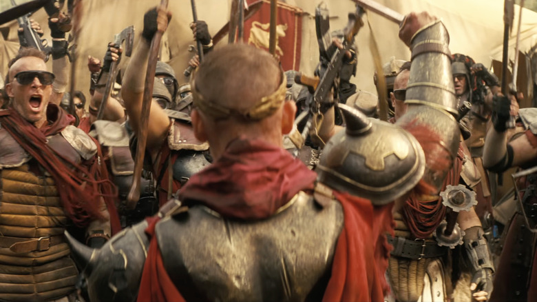 Members of Caesar's Legion pumping their fists in Fallout