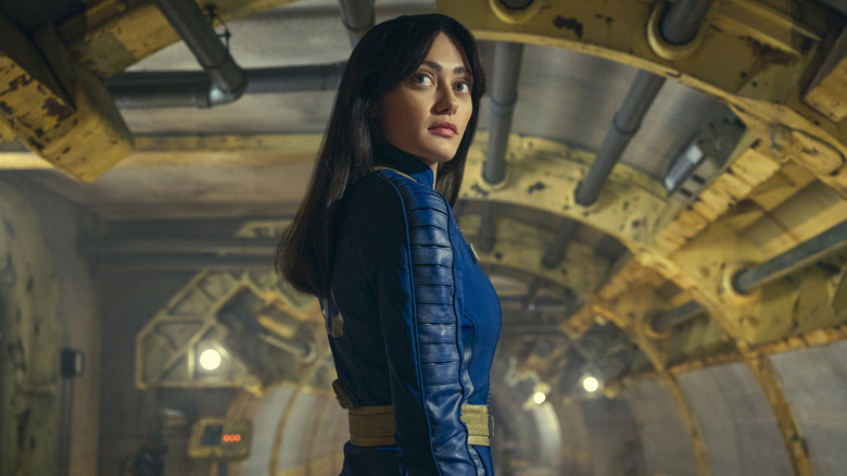 Ella Purnell as Lucy in a clean vault jumpsuit inside a vault on Fallout