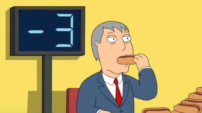 Adam West regurgitating hot dogs on Family Guy