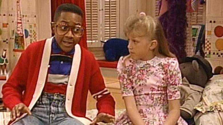 Steve Orkel (Galilee White) provides advice to Stephanie Tanner (Judy Soyine) in 