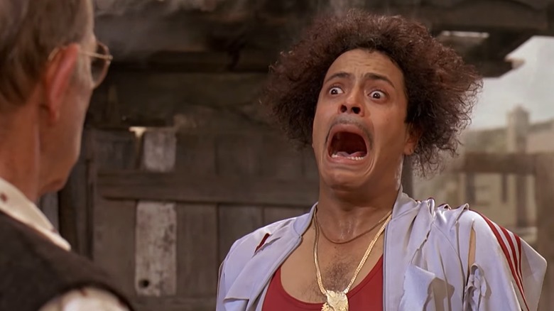 The landlord's enforcer gets electrocuted in Batteries Not Included