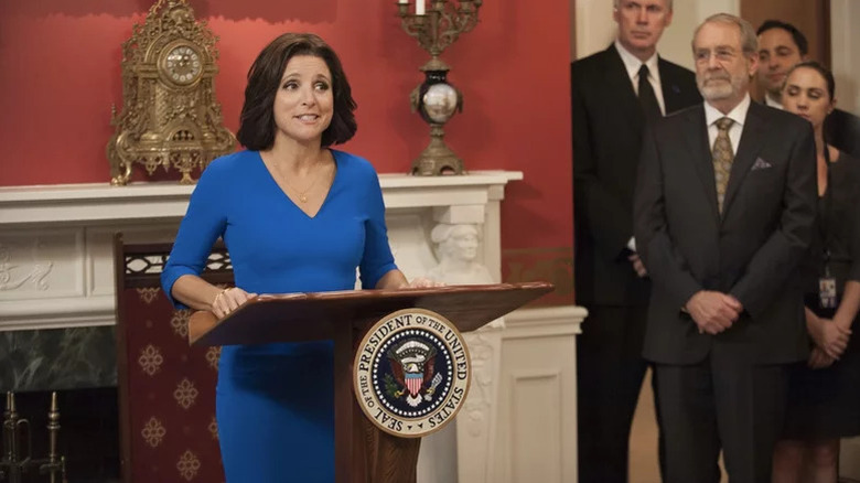 Veep's Selina Meyer standing at podium