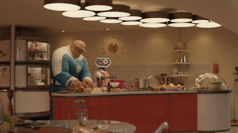 The Thing and H.E.R.B.I.E. making dinner in the kitchen in The Fantastic Four: First Steps