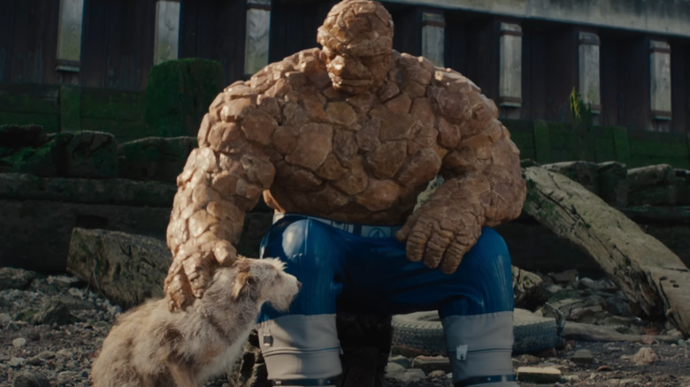 The Thing petting a dog in The Fantastic Four: First Steps