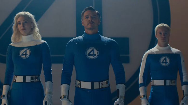 Sue Storm by Vanassa Kirby, Reed Richards by Pedro Pascal and Johnny Storm by Joseph Quinn preparing to appear on Ted Gilbert's show in The Fantastic Four: First Steps