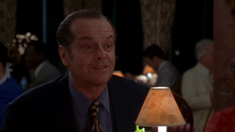 Melvin Udall at a dinner table in As Good As It Gets