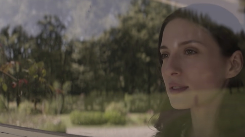 Maria Valverde staring out the window in Fever Dream