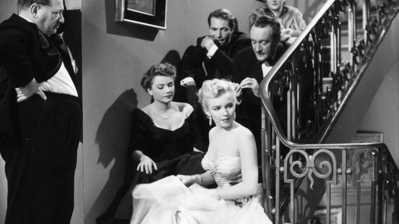 Marilyn Monroe with Anne Baxter, George Sanders, and Gary Merril in All About Eve