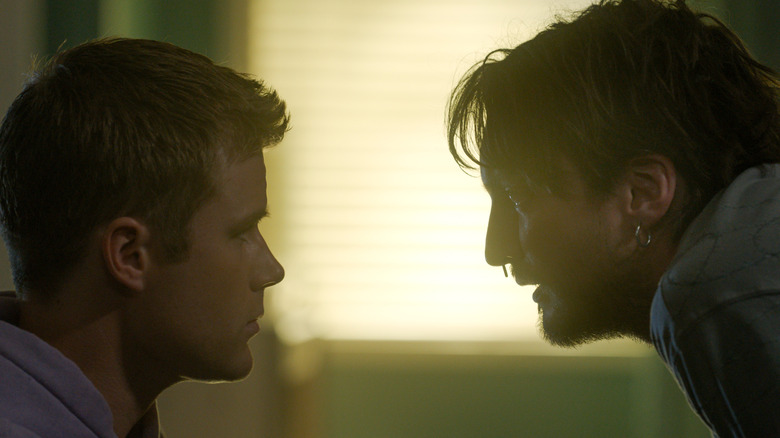 Erik looks at Bobby and tries to comfort him in Final Destination Bloodlines