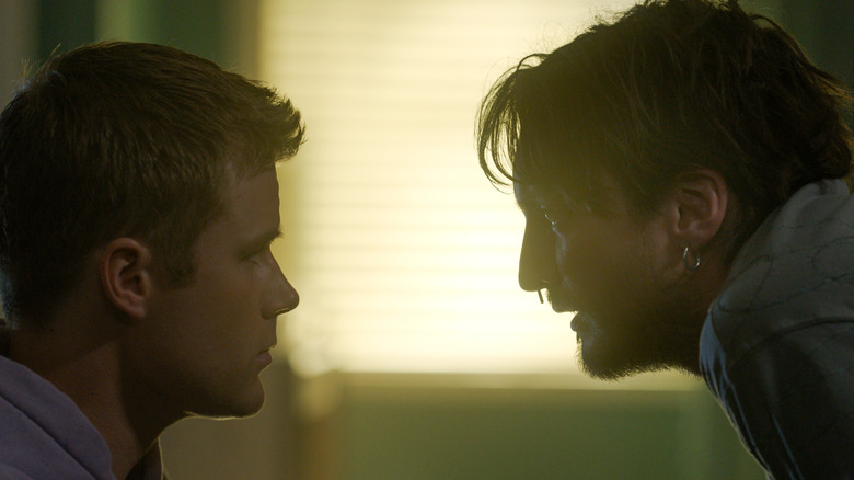 Erik looks at Bobby and tries to comfort him in Final Destination Bloodlines