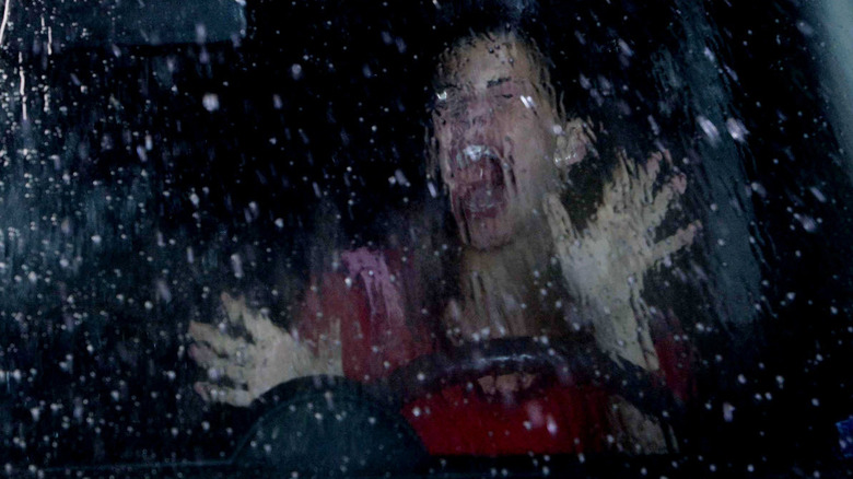 A woman screams in a wet car in the final destination.