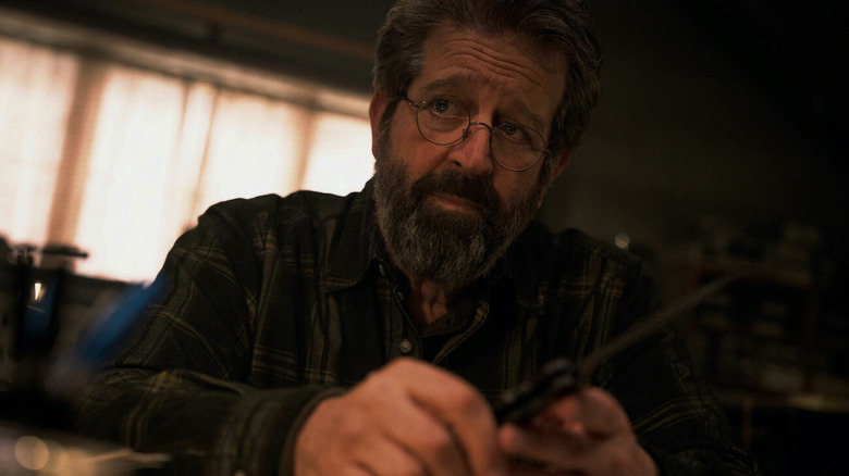 William Dono holds a knife in the mission: impossible - the final account