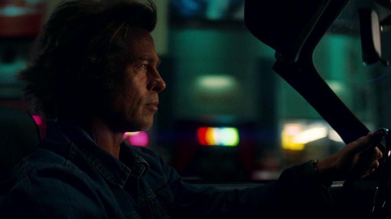 Brad Pitt's Cliff Botth driving his car through the streets of Los Angeles in Once Upon a Time in Hollywood